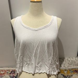 Brand: So. Size small. White flowy tanktop. Ruffled at bottom